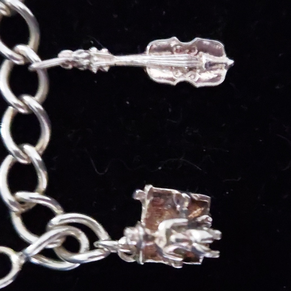 Sterling silver charm bracelet with music theme. - Picture 4 of 5